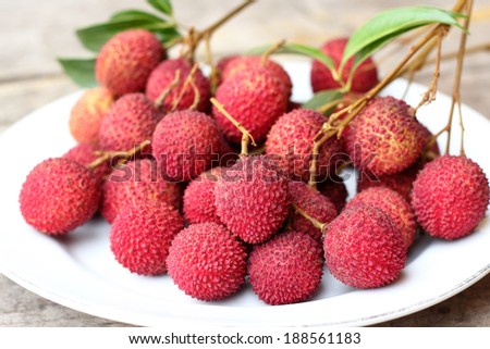 fresh litchi  fruit on white plate