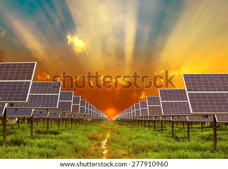 solar energy panel on sunrise background