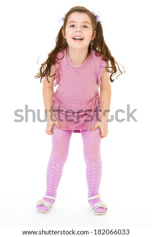Charming girl jumping on a trampoline.Isolated on white background.