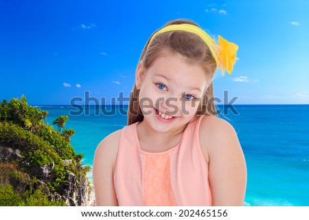 sweet smile charming girl.holiday at the seaside,active lifestyle,happiness concept,carefree childhood concept.