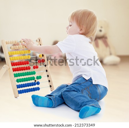 boy believes in the accounts of the Montessori classroom.the concept of a happy childhood, education of children, teens