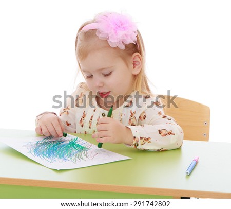 The blonde girl draws a marker on the sheet of paper - isolated on white background