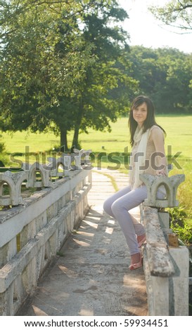 Young woman taking a walk in the park