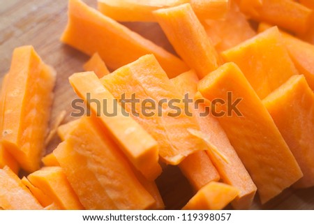 A pile of small pieces of carrot cut before being cooked