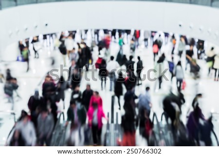Blurred crowded people in shopping mall