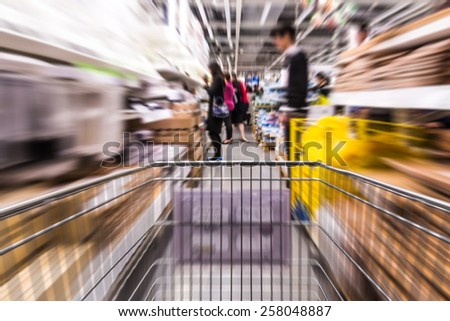 Motion blurred shopping inside home store