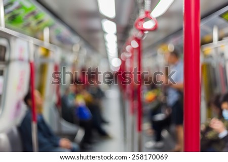 Blurred city people lifestyle background / inside the train