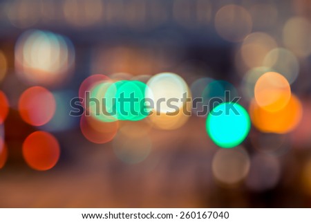 Abstract background of bokeh light at city night / with vintage color tone tuned
