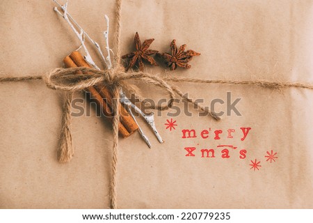 Handcrafted and ecological Christmas package printed with block letters
