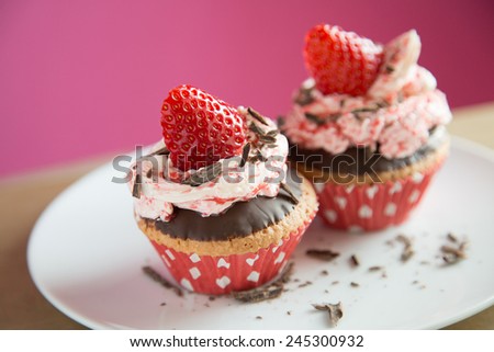 Strawberry cupcakes with chocolate in a dish