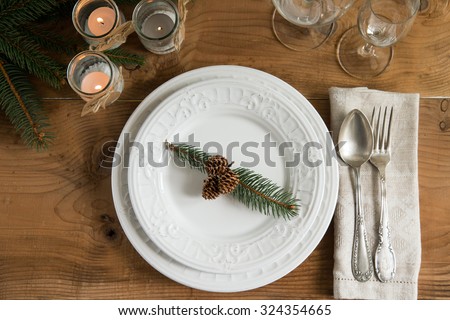 Rustic and natural Christmas table setting. Top view.