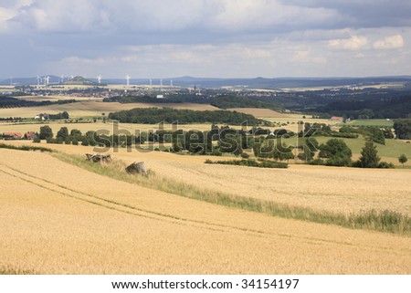 rural german landscape with city of Warburg in the background
