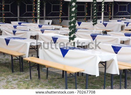 typical folding bench and table sets at a german traditional fair