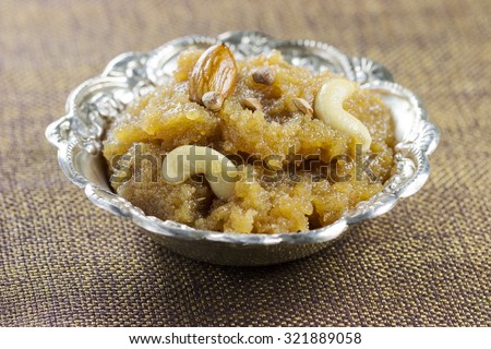 Moong Daal Halva (Indian sweets/desert) topped with dry fruits.