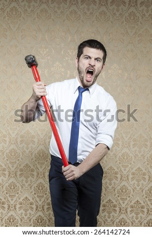businessman with a hammer seems battle cry