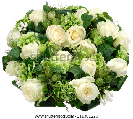 Flower bouquet of cream-white roses and green leaves isolated on white.