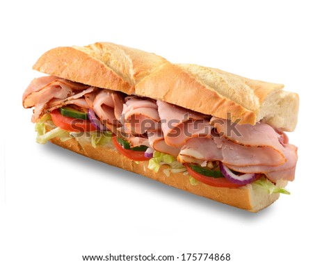 Ham and salad submarine sandwich from freshly cut baguette. Isolated on white with small shadow.
