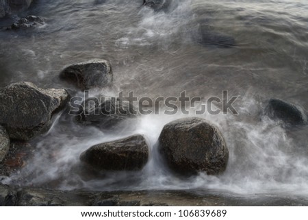 Rocks at the water\'\'s edge, Sweden.