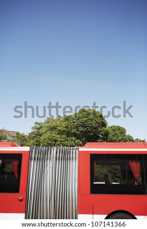 A part of a red bus passing, Stockholm, Sweden.