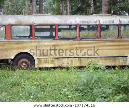 A rusty, old bus in the forest, Sweden.