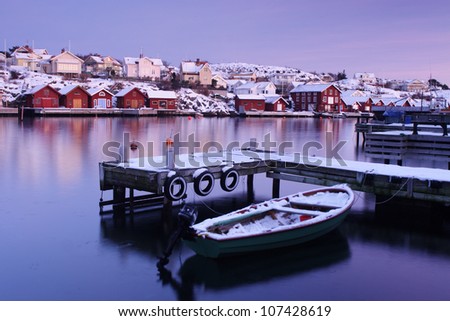 A boat and a jetty in the winter, Sweden.