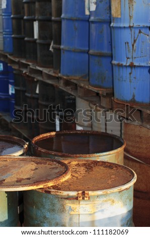 Old oil drums at a dump