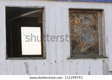 Worn out windows of a boat in Gothenburg, Sweden