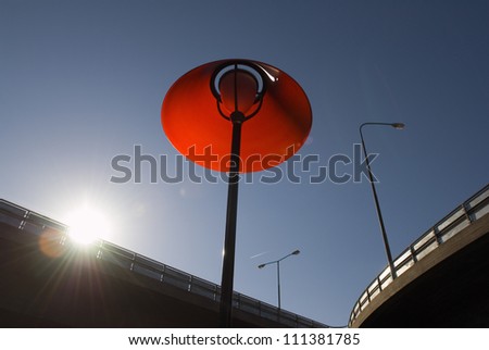 Highway bridge and a red lamp, Stockholm, Sweden