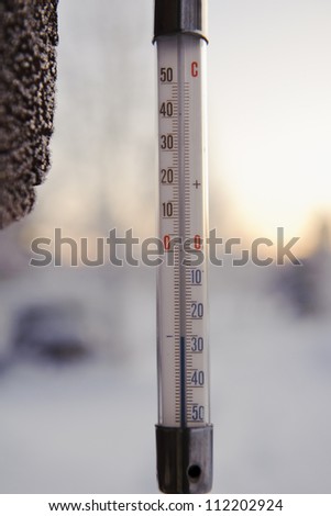 Thermometer reading minus thirty Celsius degrees