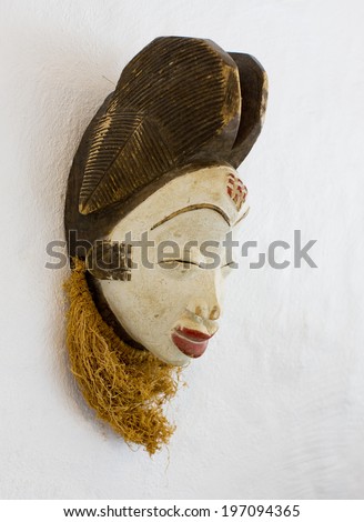 African mask on wall, close-up