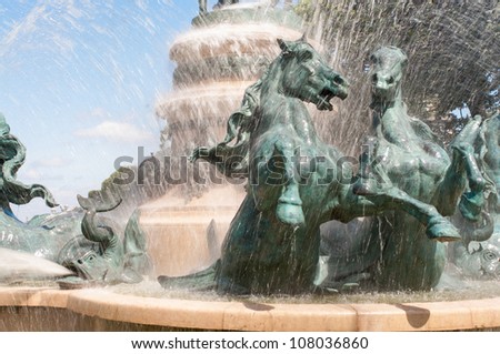 Sculpture of horses in the fountain near the garden of Luxembourg in Paris