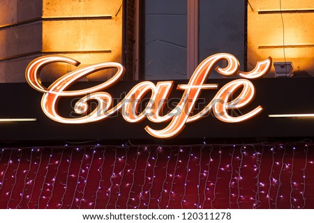 Neon sign of French cafe at christmas time, Paris, France