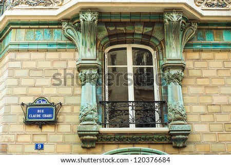 Windows decorated with porcelain in Paris, France