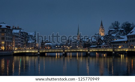 Zurich covered by snow at night