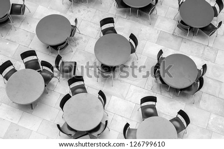 bird eye view of chairs and tables in the university of Zurich