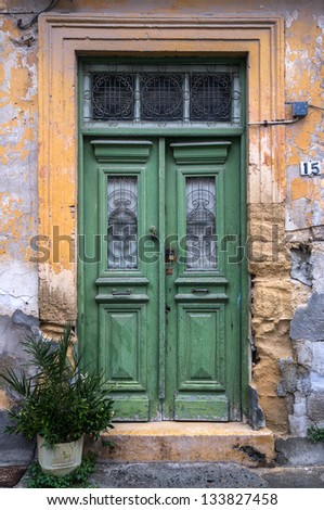 Old dilapidated wooden door in Nicosia, Cyprus