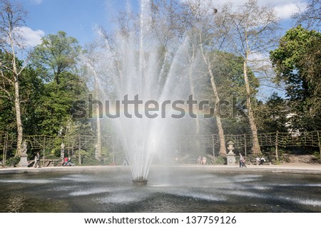 Fountain with rainbow in the park of brussels, Belgium