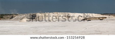 panoramic view of  Giraud pink salt flats and machines.Camargue park, Rhone delta, Provence, France.