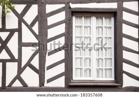 Closed window of timber frame building in Gerberoy, Oise, France