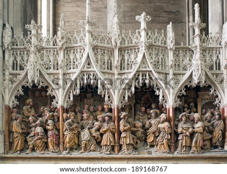 AMIENS, FRANCE - APR 22, 2014: Wooden sculptures represents Bible stories in the Notre Dame Cathedral of Amiens, France.