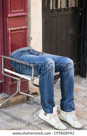 A plastic model\'s legs with blue jeans on the street, Orleans, France
