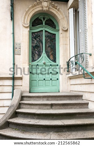 Art nouveau style wooden door in Nancy, France