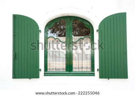 Green wooden window in La Flotte, Ile de Re, France