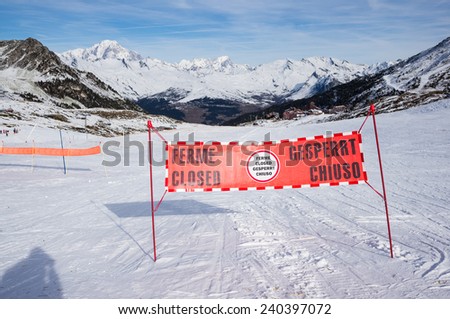 Red sign at mountains indicating the closure of the piste, Les Arcs, Bourg Saint Maurice, Savoie, France