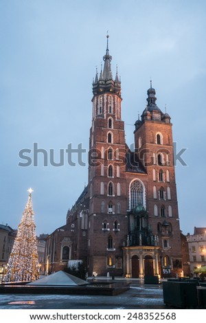 Krakow in Poland at dawn. St Mary\'s Basilica (Mariacki Church)  on Main Square in the Old Town.
