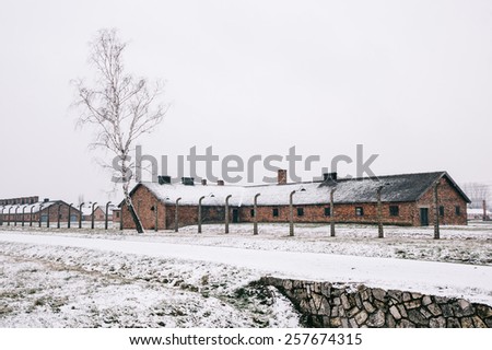 A red brick house in the snow covered concentration camp of Auschwitz  Birkenau, Poland