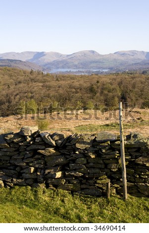 Dry stone wall and wire fence in the Lake District, England