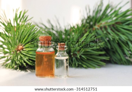 pine aroma oil extract natural in cosmetic bottles aromatherapy setting