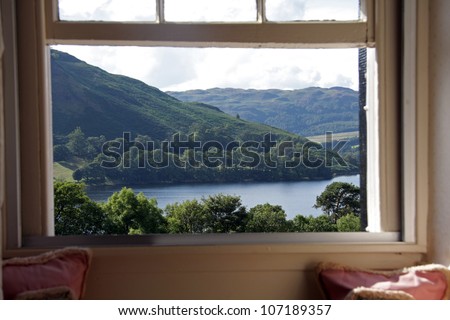 a picture window with a view onto Lake Ullswater and across to the Cumbrian hills