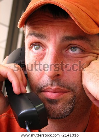 stock photo closeup of a young mature man having a hard time on the